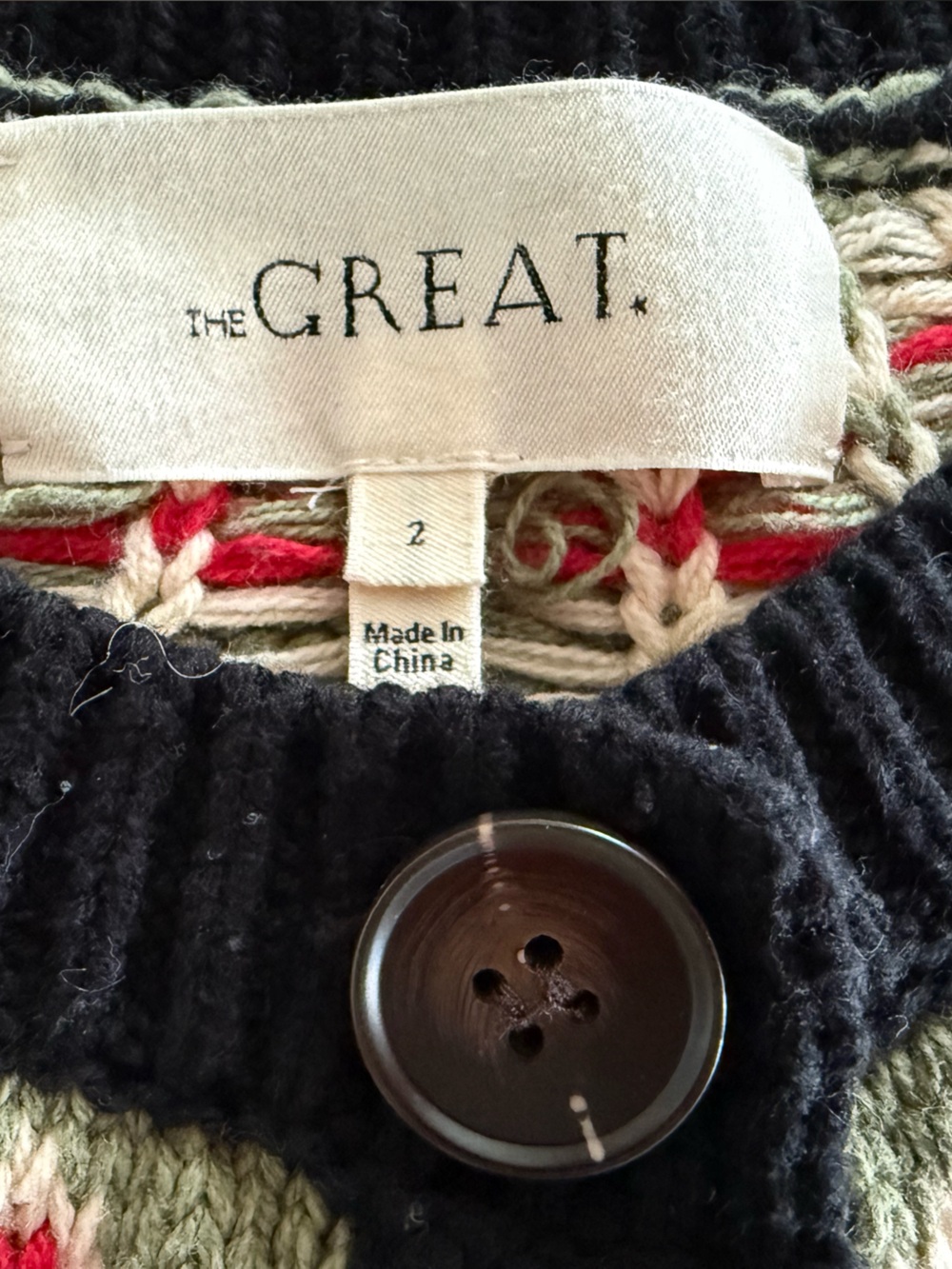 THE GREAT. Black Fair Isle Button Cardigan with Red and Cream Accents - Picture 2 of 5